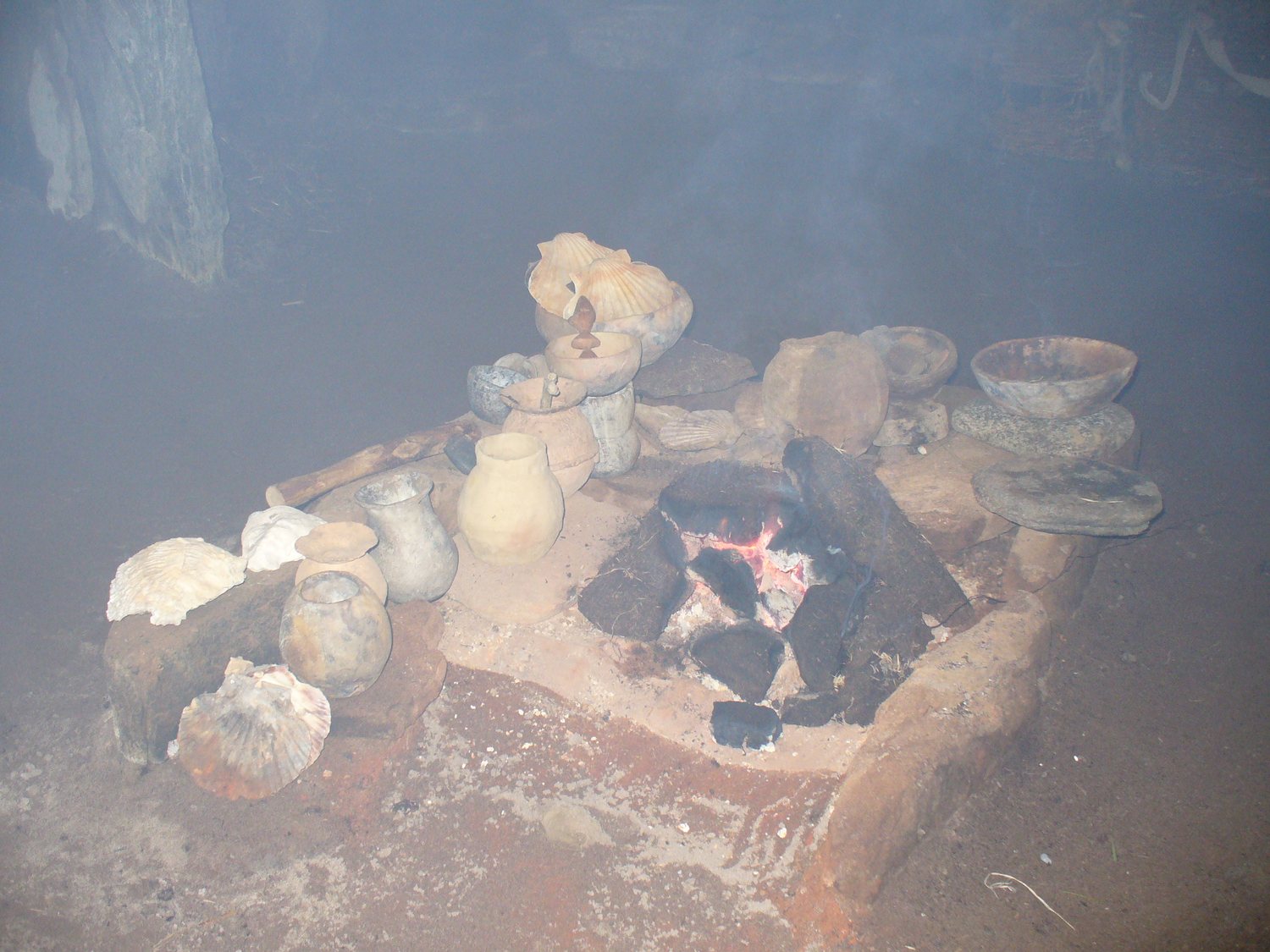 A low peat fire glowing in a hearth