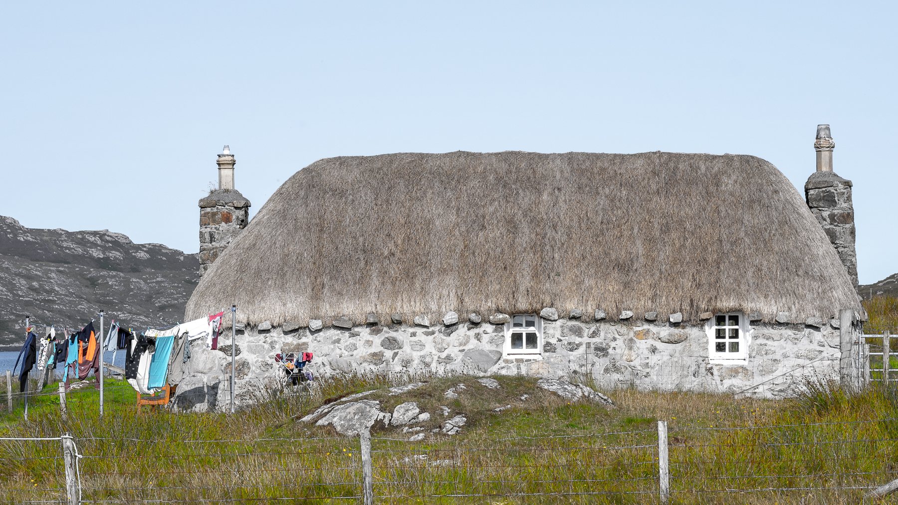 A traditional thatched croft house in the Outer Hebrides