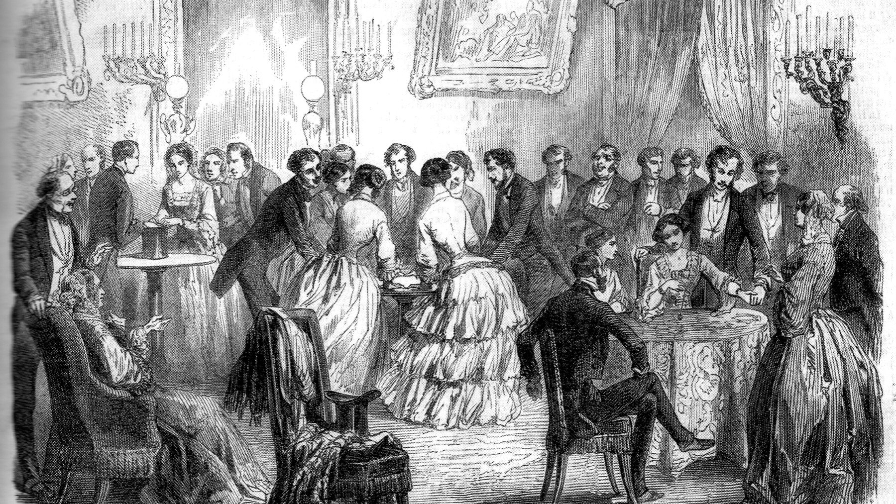 An 1853 illustration of a Victorian drawing room table turning session